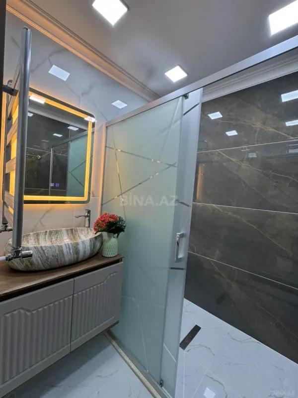 Satılır 3 otaqlı mənzil 128 m²