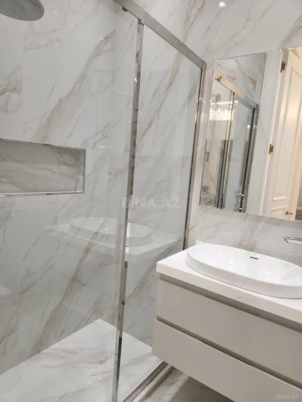 Satılır 4 otaqlı mənzil 150 m²