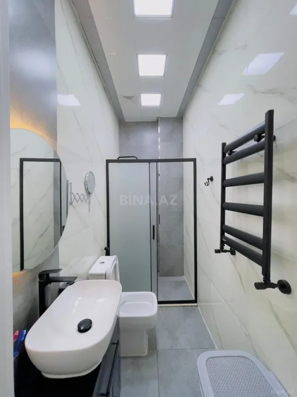 Satılır 4 otaqlı mənzil 128 m²