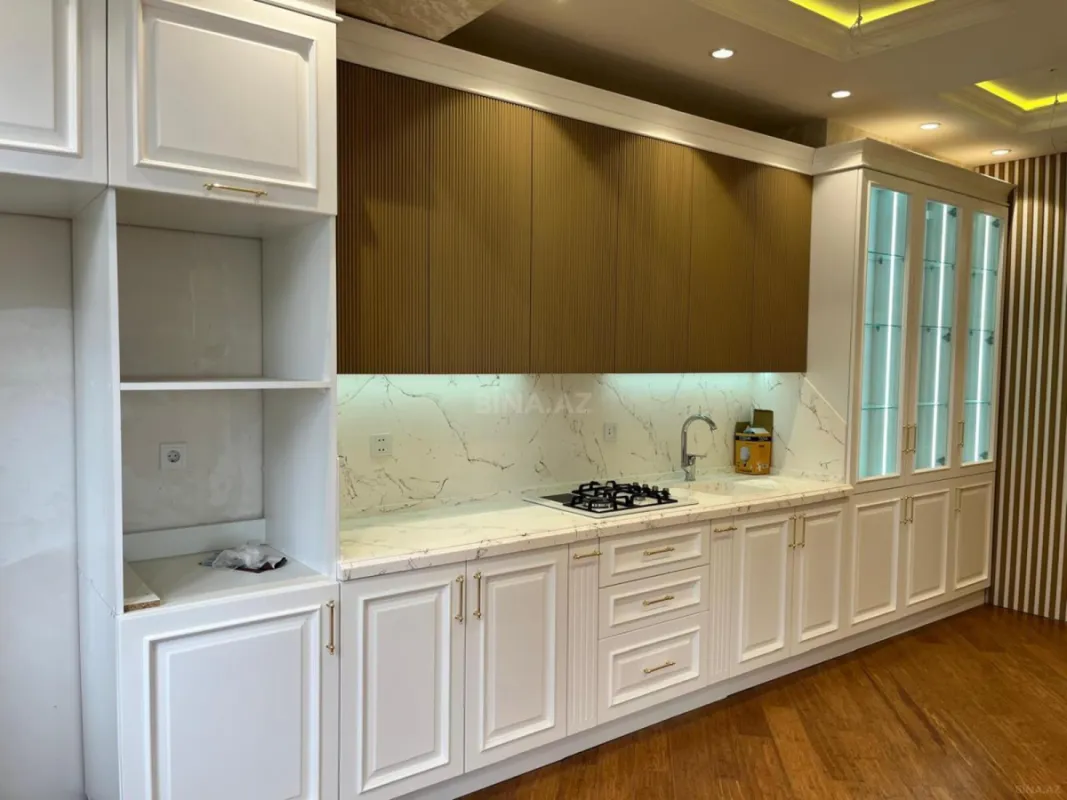 Satılır 4 otaqlı mənzil 143 m²