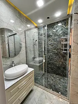 Satılır 4 otaqlı mənzil 143 m²