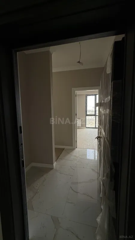Satılır 2 otaqlı mənzil 52.9 m²