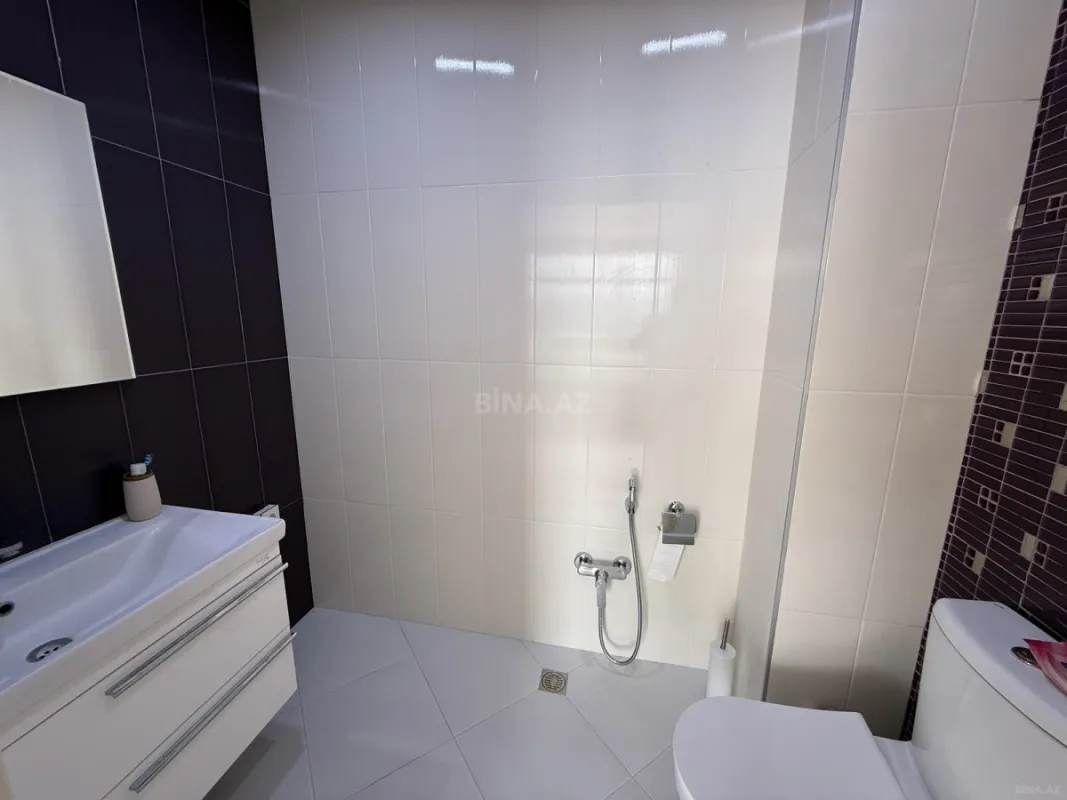 Satılır 4 otaqlı mənzil 210 m²