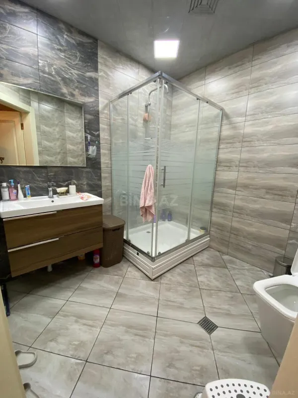 Satılır 4 otaqlı mənzil 206 m²