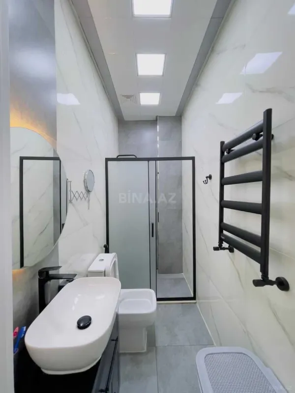 Satılır 4 otaqlı mənzil 130 m²