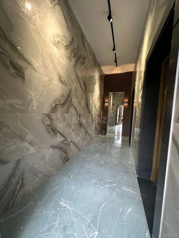 Satılır 4 otaqlı mənzil 158 m²