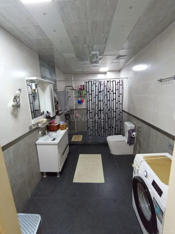 Satılır 4 otaqlı mənzil 156 m²