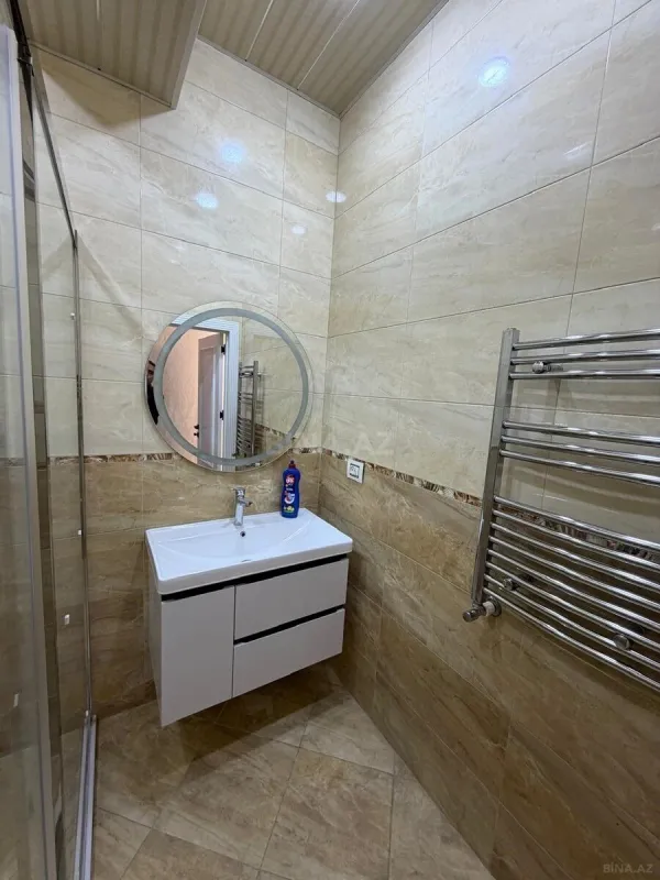 Satılır 4 otaqlı mənzil 132 m²