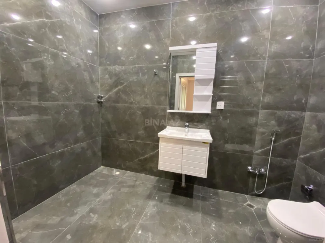 Satılır 4 otaqlı mənzil 178 m²