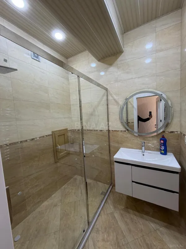 Satılır 4 otaqlı mənzil 129 m²