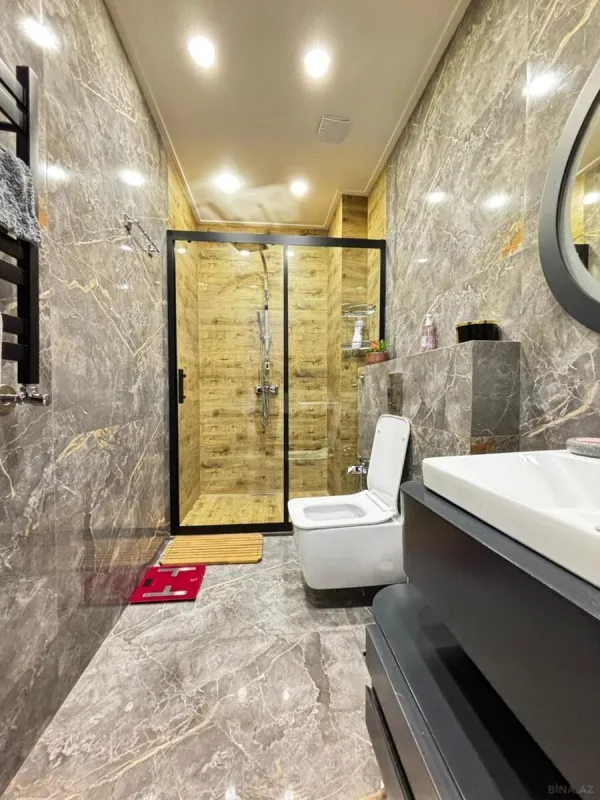 Satılır 4 otaqlı mənzil 136 m²