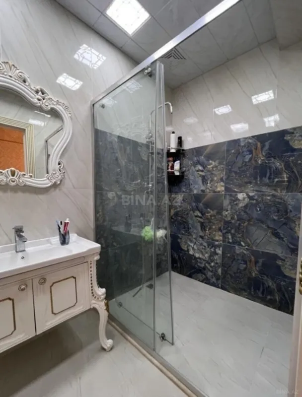 Satılır 4 otaqlı mənzil 215 m²