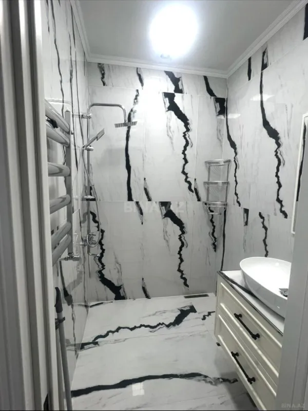 Satılır 3 otaqlı mənzil 128 m²