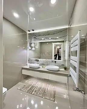 Satılır 4 otaqlı mənzil 200 m²