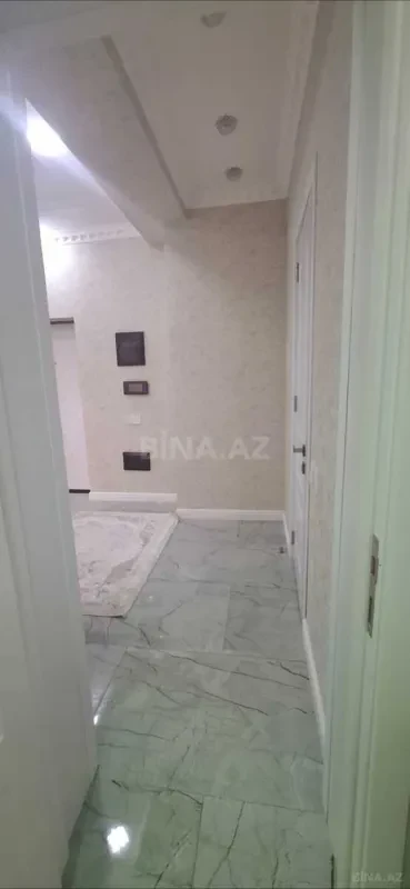 Satılır 2 otaqlı mənzil 63 m²