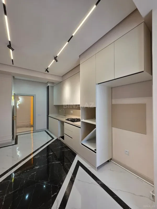 Satılır 3 otaqlı mənzil 125 m²