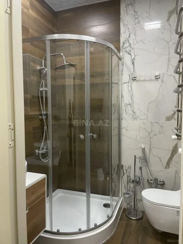 Satılır 4 otaqlı mənzil 210 m²