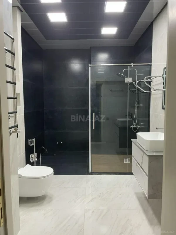 Satılır 4 otaqlı mənzil 210 m²