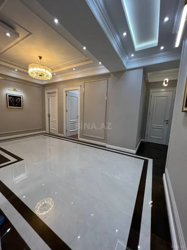 Satılır 4 otaqlı mənzil 164 m²