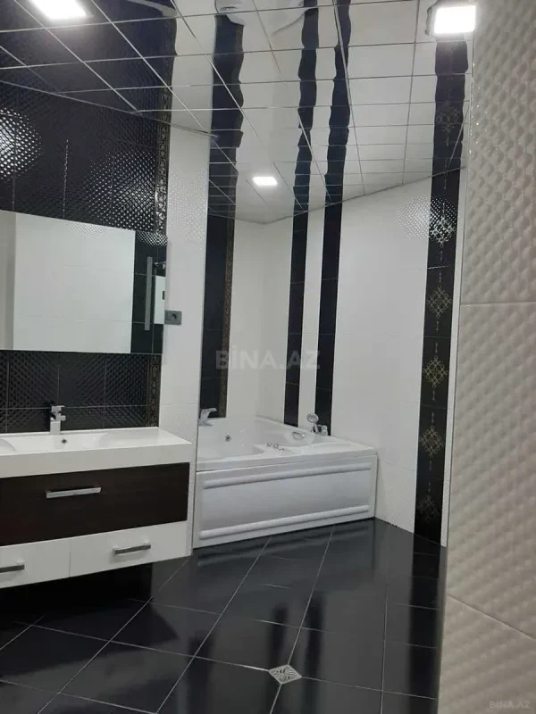 Satılır 4 otaqlı mənzil 231 m²
