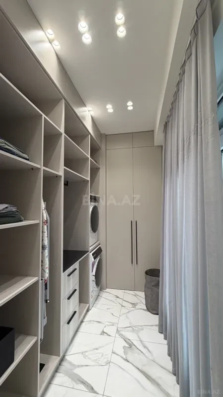 Satılır 4 otaqlı mənzil 328 m²
