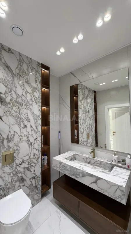 Satılır 4 otaqlı mənzil 328 m²