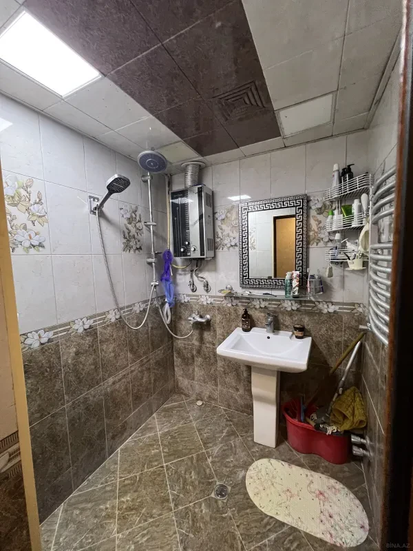 Satılır 4 otaqlı mənzil 100 m²