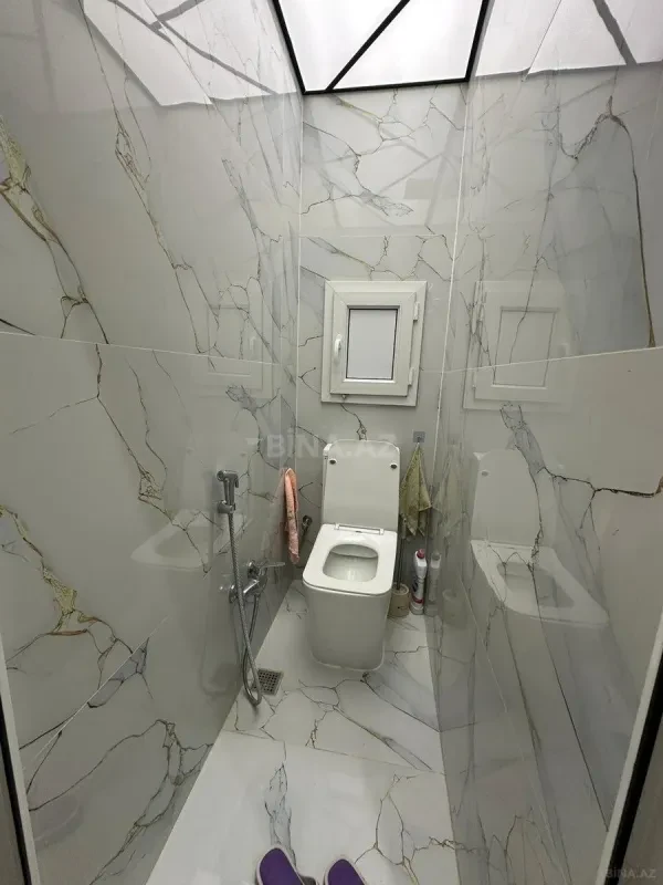 Satılır 5 otaqlı mənzil 112 m²