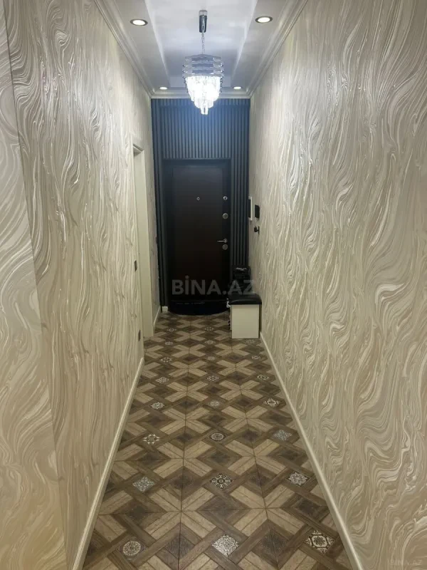 Satılır 4 otaqlı mənzil 165 m²