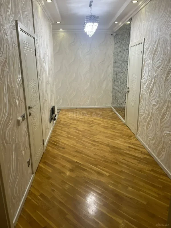 Satılır 4 otaqlı mənzil 165 m²