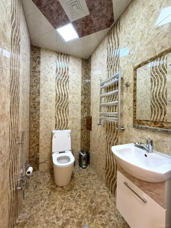 Satılır 3 otaqlı mənzil 130 m²