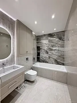 Satılır 4 otaqlı mənzil 180 m²