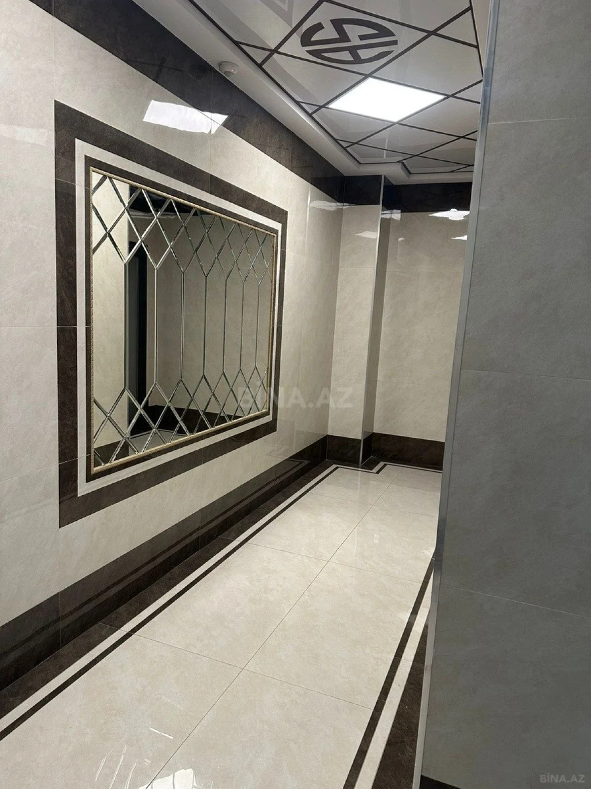 Satılır 5 otaqlı mənzil 202 m²