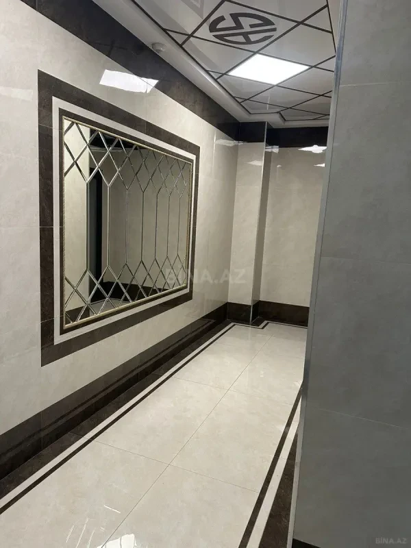 Satılır 5 otaqlı mənzil 202 m²