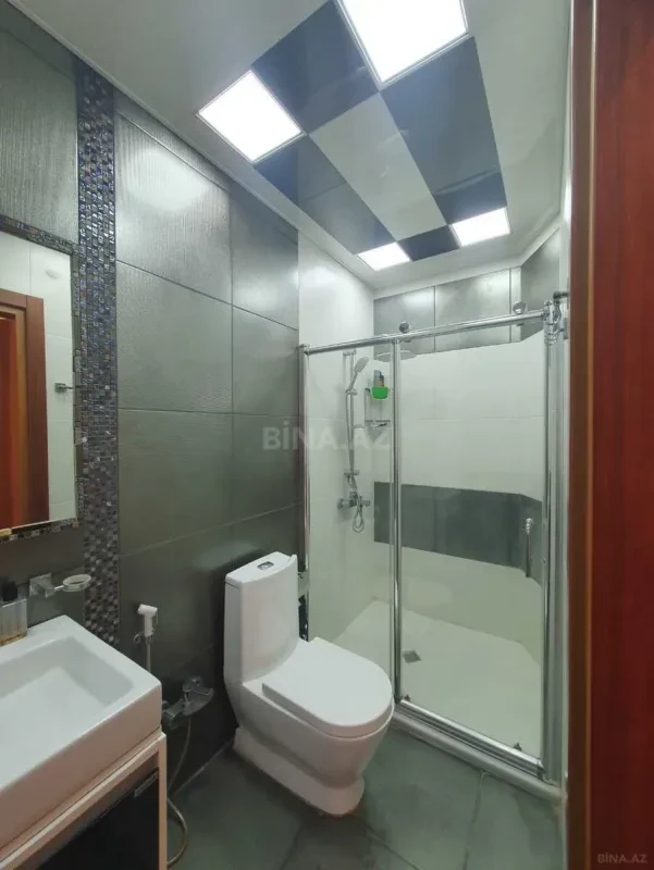 Satılır 4 otaqlı mənzil 130 m²