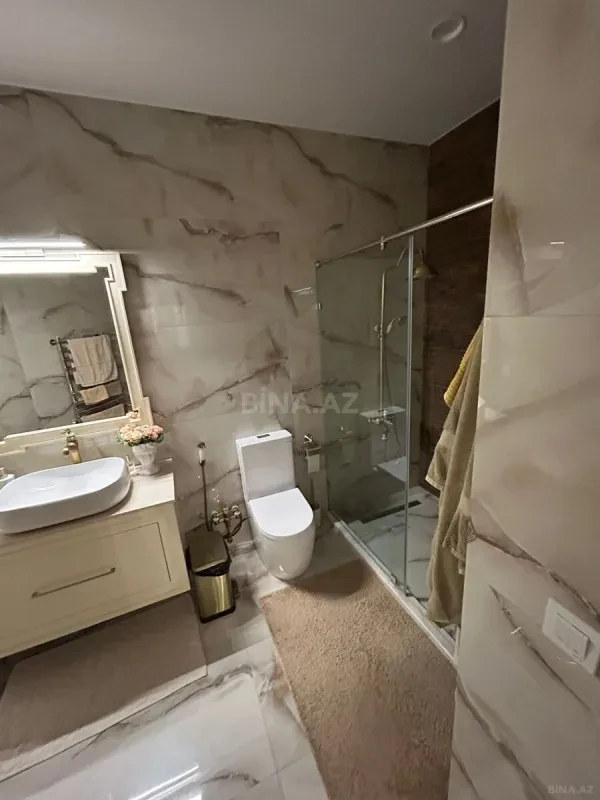 Satılır 4 otaqlı mənzil 100 m²