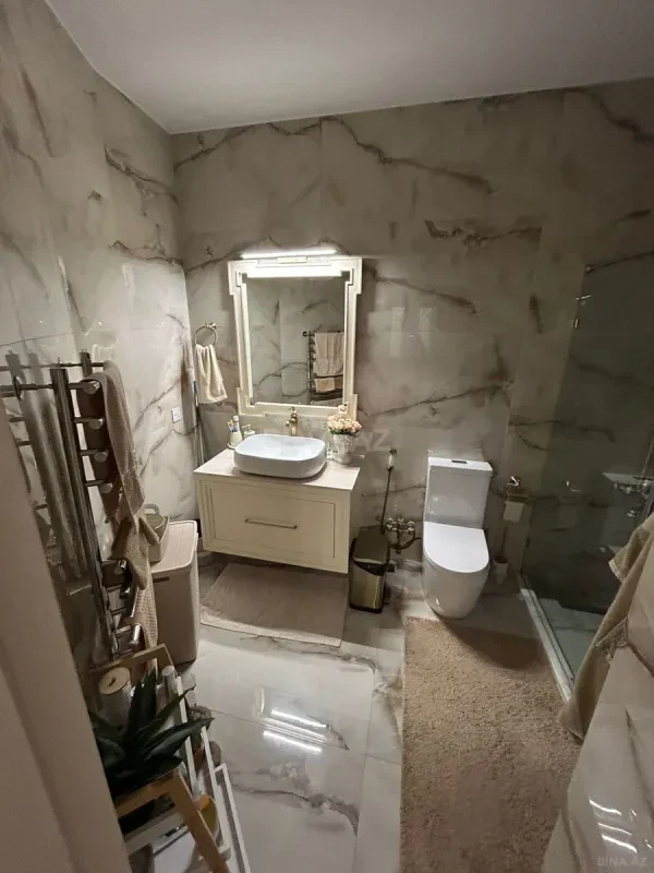 Satılır 4 otaqlı mənzil 100 m²