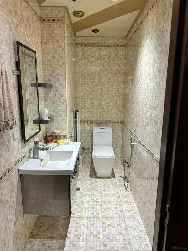 Satılır 4 otaqlı mənzil 138 m²