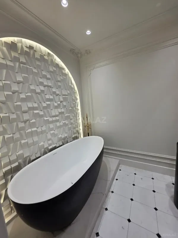 Satılır 4 otaqlı mənzil 165 m²