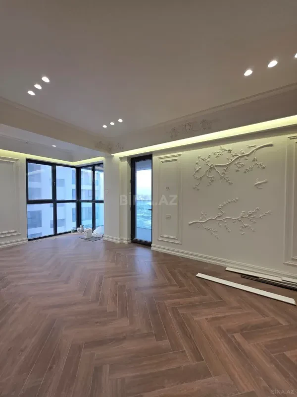Satılır 4 otaqlı mənzil 165 m²