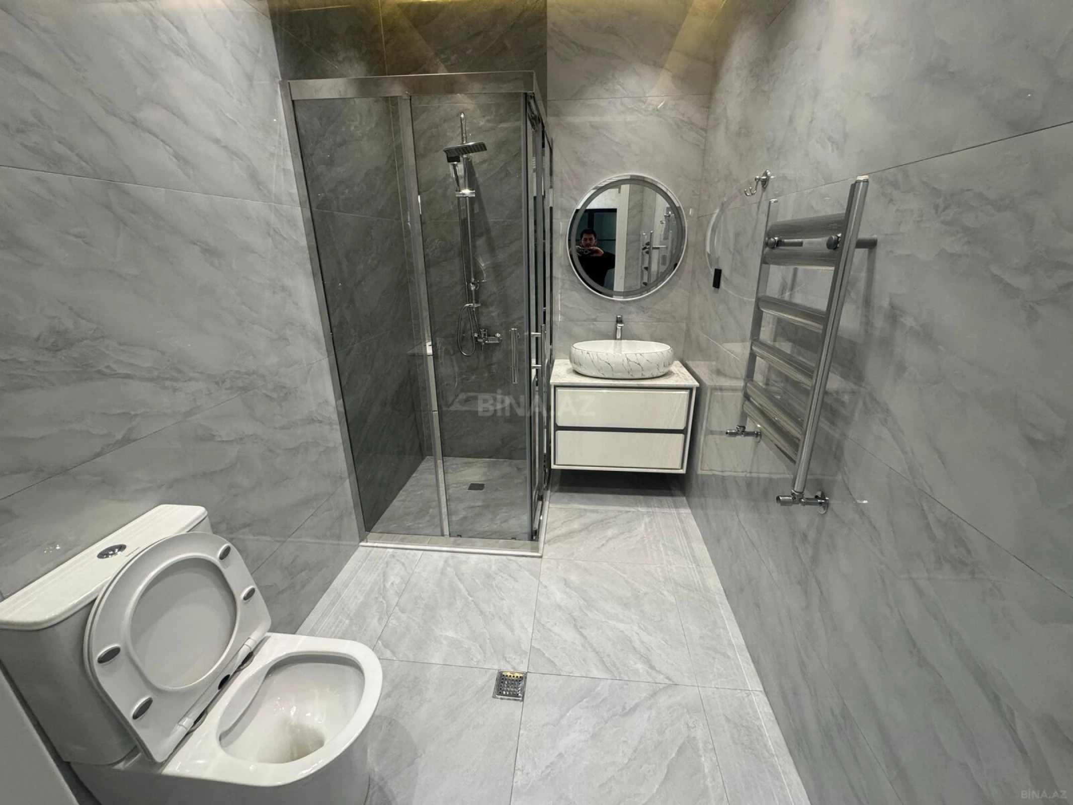 Satılır 4 otaqlı mənzil 127 m²