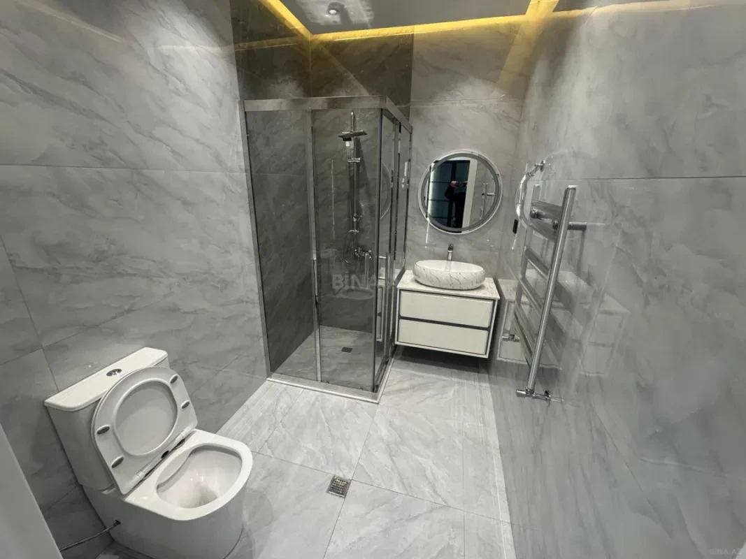 Satılır 4 otaqlı mənzil 127 m²