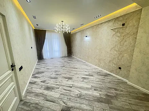Satılır 4 otaqlı mənzil 127 m²