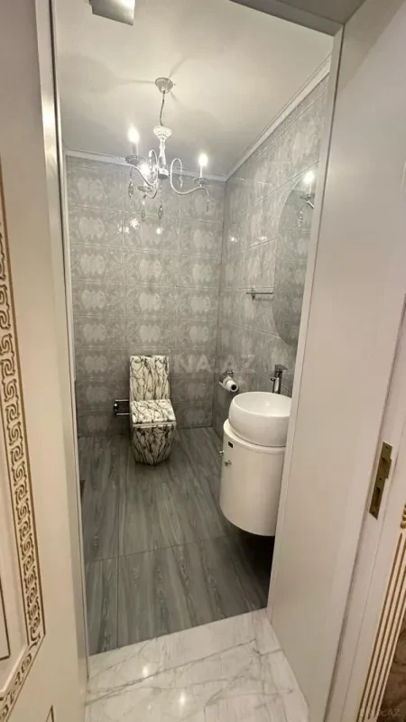 Satılır 4 otaqlı mənzil 148 m²
