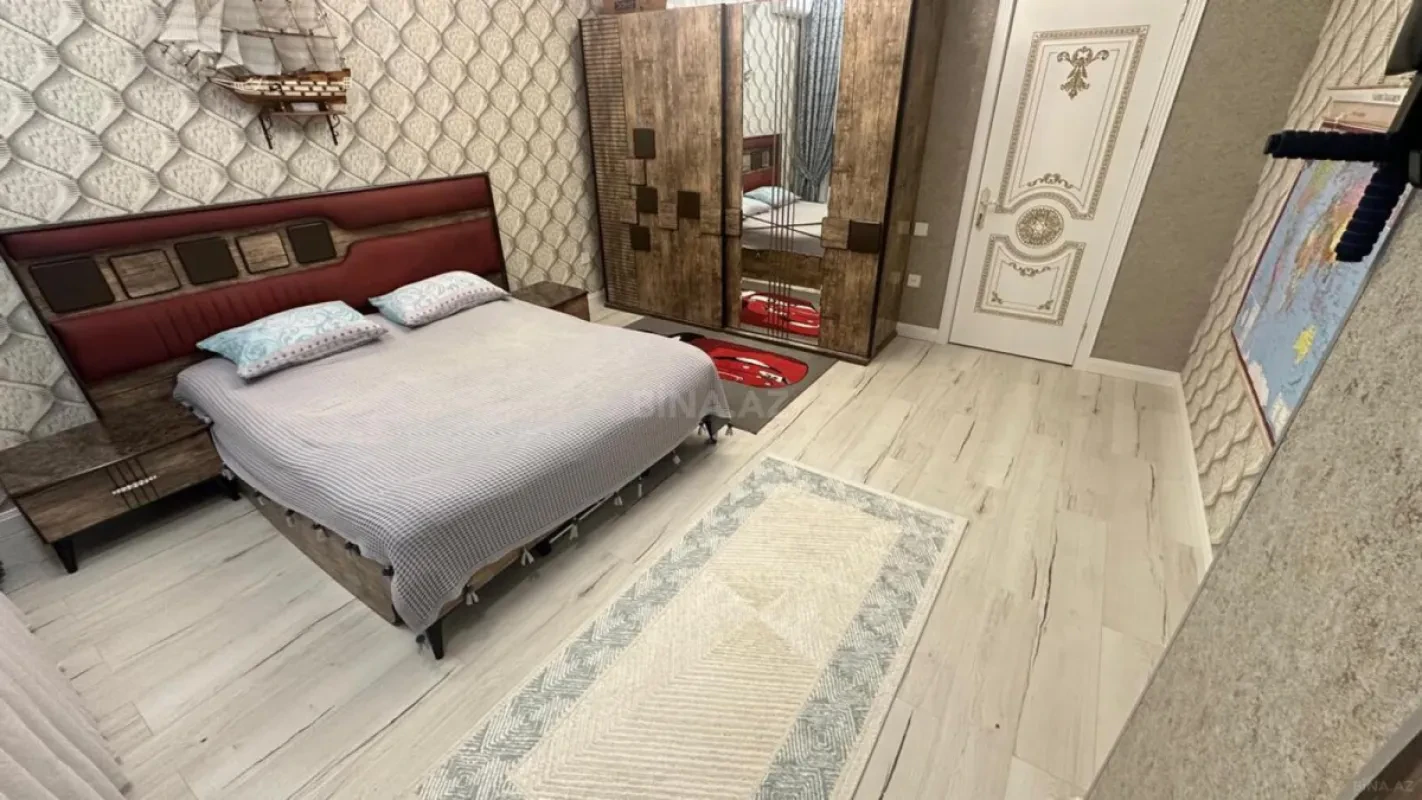 Satılır 4 otaqlı mənzil 148 m²