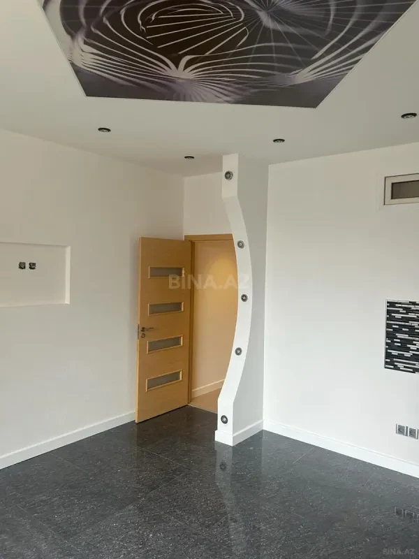 Satılır 4 otaqlı mənzil 197 m²