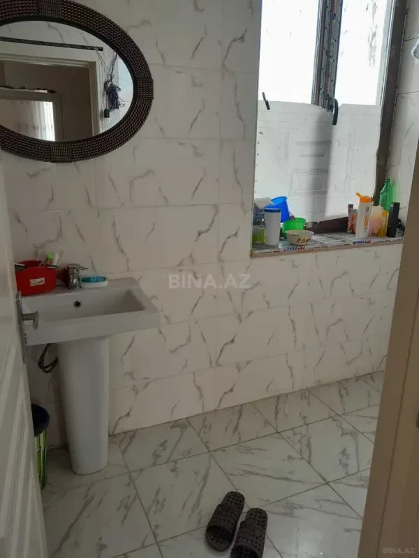 Satılır 9 otaqlı həyət evi 300 m²