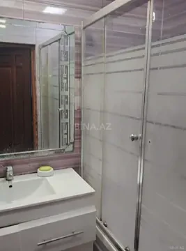 Satılır 4 otaqlı mənzil 121 m²