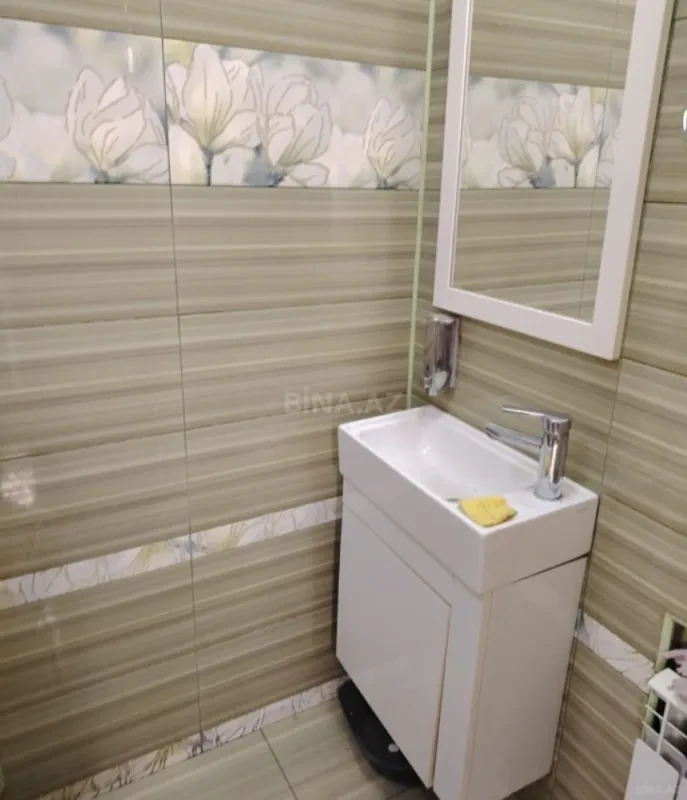 Satılır 4 otaqlı mənzil 121 m²