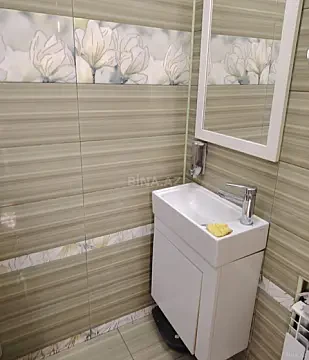 Satılır 4 otaqlı mənzil 121 m²